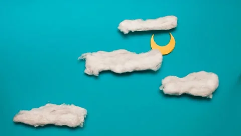 The moon goes through a full cycle in the sky among the clouds Video stock 144207949