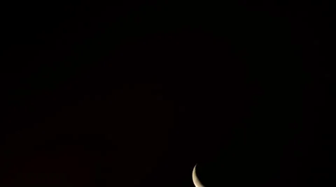 Moon going up on a clean black sky 스톡 동영상 37756345