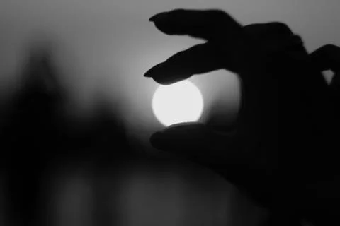 The moon in the hands of man Stock Photos
