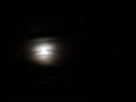 The moon illuminated the clouds Stock Photos