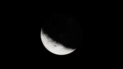 The moon illuminated by the sun in view from above Stock Footage 245814209