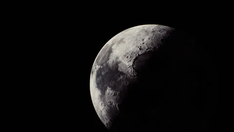 Moon illuminated by sunlight showcasing surface craters and details Stock Footage 331423931