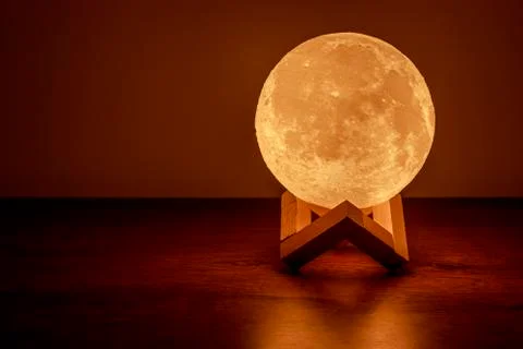Moon lamp on the table Stock Photos