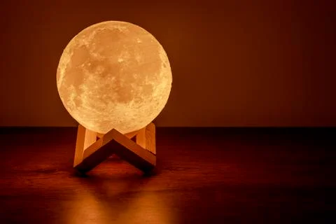 Moon lamp on the table Stock Photos