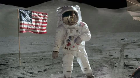 Moon landing scene with astronaut taking picture next to the American flag slow  Stock Footage