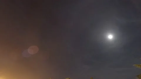 Moon light n rising star on night sky n bokeh lens flare Stock Footage 157384026