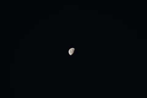 Moon lighted by Sun Stock Photos