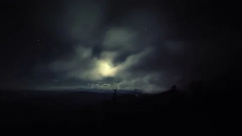Moon in the Mountains with Low Clouds Timelapse Stock Footage 82153750