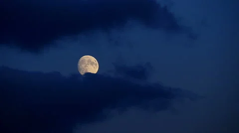 Moon moves behind clouds, time lapse Stock Footage 58058502