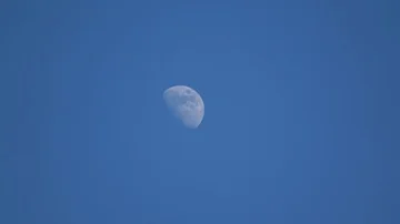 Moon moving in blue sky. 8x fast forward Stock Footage 85528206