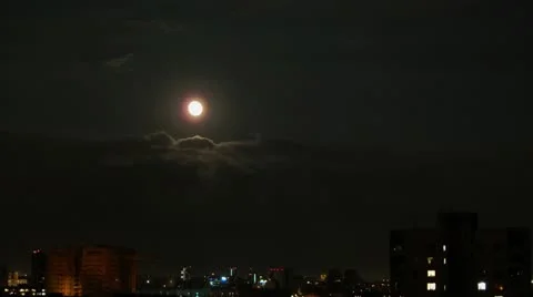 Moon in the night city Stock Footage 9835061