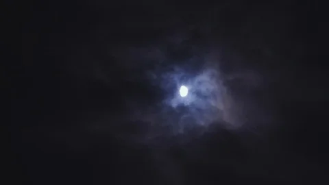 Moon at night with clouds in 4k Stock Footage 128144470