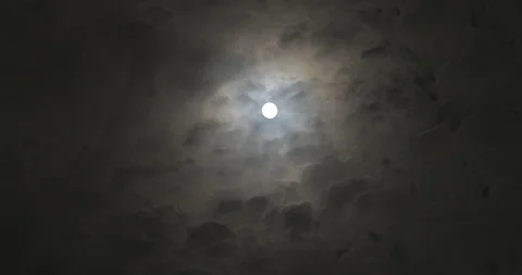 Moon at night with moving clouds Stock Footage 97943365