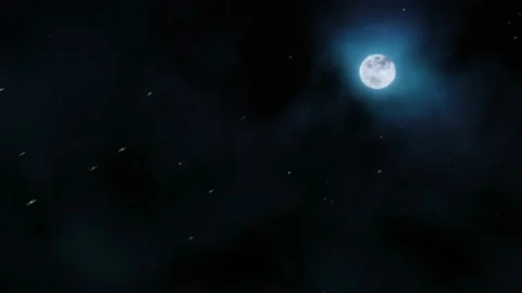 The moon in the night sky against the background of clouds and falling snow Video stock 170418718