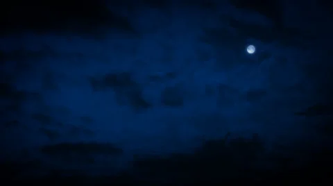 Moon In Night Sky With Clouds Passing Stock Footage