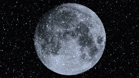 Moon in the night sky with falling snow in UHD Stock Footage 146159016