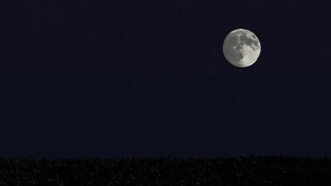 The moon in the night sky Stock Footage 74576807