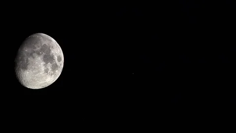 The moon in the night sky Stock Footage 92747980