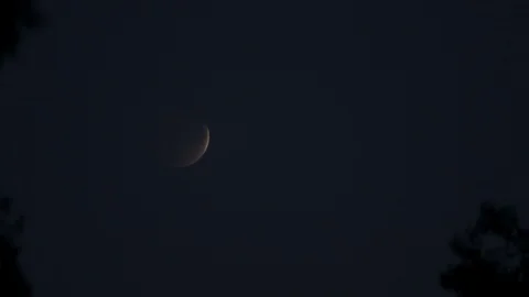 Moon in the night sky Stock Footage 106824834