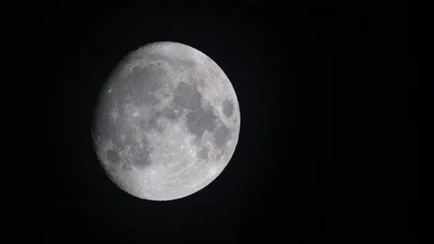 The Moon over black sky, clouds passing over Stock Footage 119544448