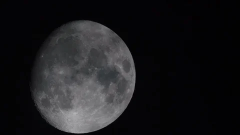 The Moon over black sky, clouds passing over Stock Footage 119546921