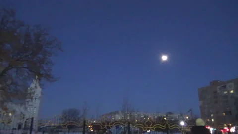 Moon over the city, flock of rooks Video stock 101481693