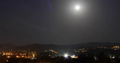 Moon over the city Stock Footage 25162088