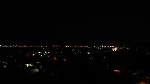 The moon over the city at night Video stock 317564963