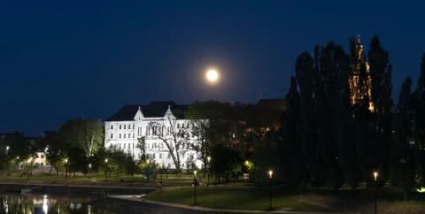 Moon over the city Stock Photos