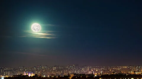 Moon over city, time lapse 4k Stock Footage 33643107