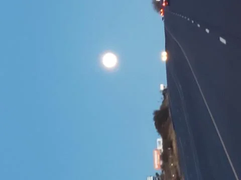 Moon over highway Stock Photos