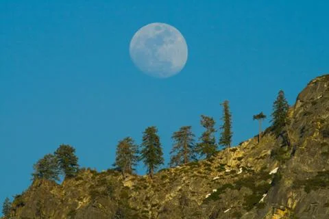 Moon over the hill Stock Photos