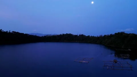 The moon over the lake before dawn 스톡 동영상 238768008