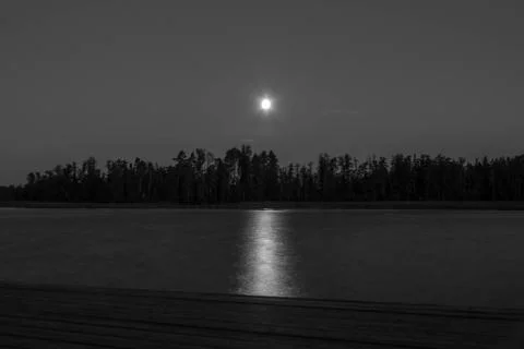 Moon over the lake Stock Photos