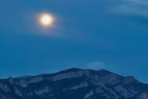 Moon over the mountain Stock Photos