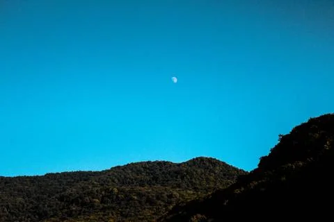 Moon over the mountains Stock Photos