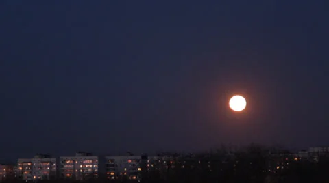 Moon over night city Stock Footage 32062299
