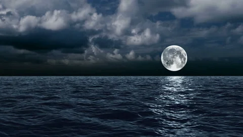 The moon over the sea in the clouds Stock Footage 87500658