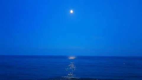 Moon over the sea Stock Photos