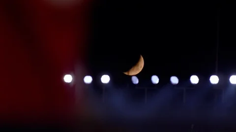 Moon over the stadium lights Stock Footage 102100759