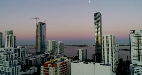 Moon over sunsetting Miami Stock Footage 172164940