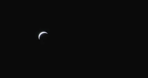 Moon Partially Blocking The Face Of The Sun During Solar Eclipse. Stock Footage 276837008