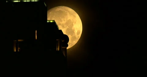 Moon passing behind skyscraper Atlanta, GA 04-02-2015 Stock Footage 48863155