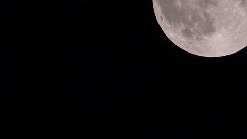 Moon with a passing satellite -2 Stock Footage 147508749