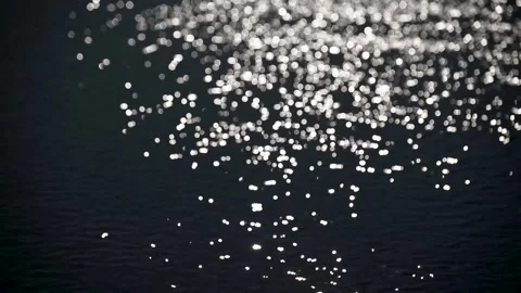 Moon path on the surface of a mountain r... | Stock Video | Pond5