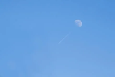 Moon with plane Stock Photos