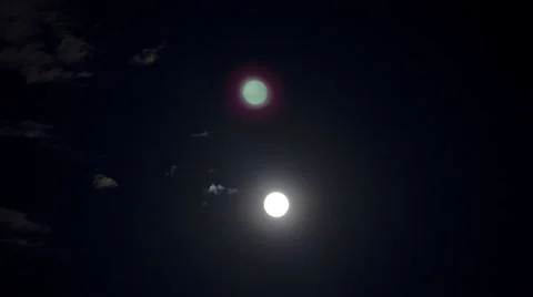 Moon Reflected on Water with Clouds Stock Footage 68855267