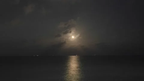 Moon reflection oversea cloudy weather timelapse Stock Footage 145091123