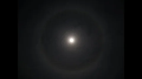 Moon with Ring of bright light shining around it timelapse Video stock 86298050