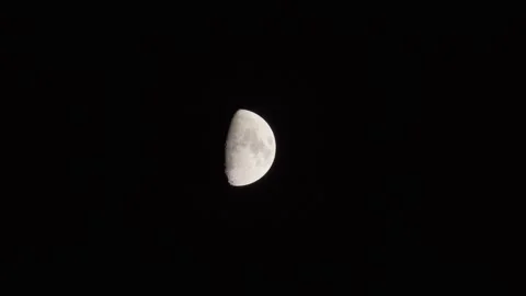 The moon rises in the evening. Timelapse video Stock Footage 255757541